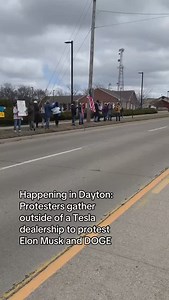 170K views · 5.9K reactions | Locals gathered outside the #Tesla dealership in Dayton, Ohio to protest Elon Musk and DOGE. We have a reporter on site and will have more information to come. #daytonoh #daytonohio | Dayton Daily News | Facebook