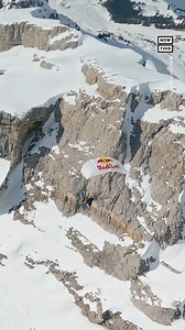 29K views · 262 reactions | Professional BASE jumper Fred Fugen dropped out of a chairlift hanging from a hot air balloon to ‘ski’ the sky before deploying his parachute. The stunt, which was organized by Red Bull, took place more than 21,000 ft in the air. Fugen spent a half hour in the chairlift before dropping into his ride. | NowThis | Facebook