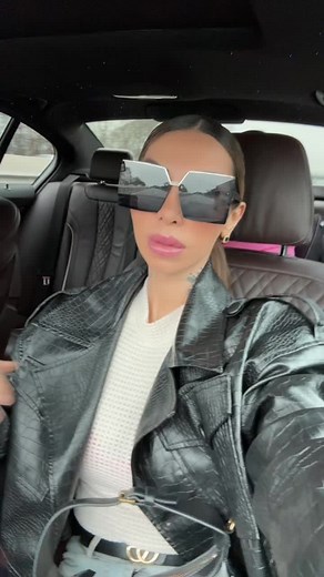 Stylish Outfit Showcase in a Moving Car