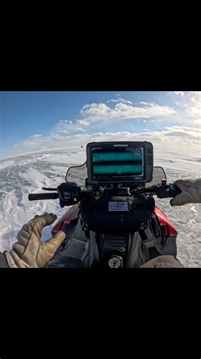 Cruising back in after a morning of fishing on the bay! #Icefishing #walleyefishing #fishing #saginawbay #snowmobile | Catchin Hell Charters