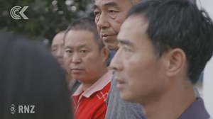 They paid $45,000 for promises of visas and work, but some of these Chinese migrant workers haven’t had a day’s work, some have been made to sign new contracts, and they all say they’ve been abandoned by the agent who charged them, then disappeared. Immigration Minister Iain Lees-Galloway promised them new visas, but that was months ago – and they’re still waiting. | Checkpoint