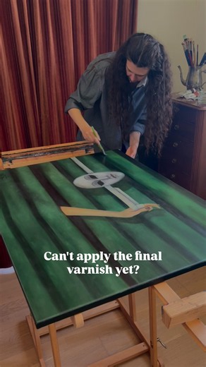 Protecting the painting with a retouching varnish while it cures.