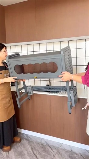 @smarthomegadgetss on Instagram: "Comment DISH to get DM 📩 This smart sink drain rack does more than you expect 💡 It drains water fast, blocks dust buildup, and even doubles as a sturdy microwave storage stand. One compact rack, cleaner countertops, and better space management—no mess, no stress. Perfect for modern kitchens that love smart organization. #KitchenEssentials #HomeOrganization #SmartStorage #ModernKitchen #amazonfind"