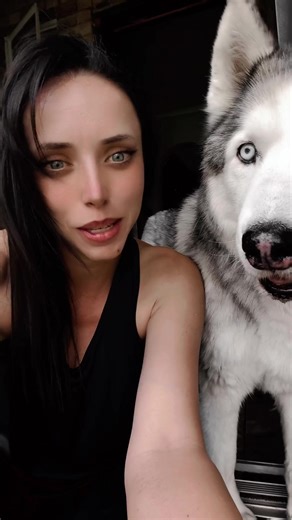 Outdoor Moments with a Dog: Woman and Pet Interaction