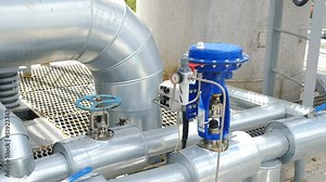 Heavy industry. Chemical refinery factory inside view. Modern equipment, steel tanks and boilers with cables, pipelines and valves for chemical mixing. Production of formalin. oil industry. 4 k video