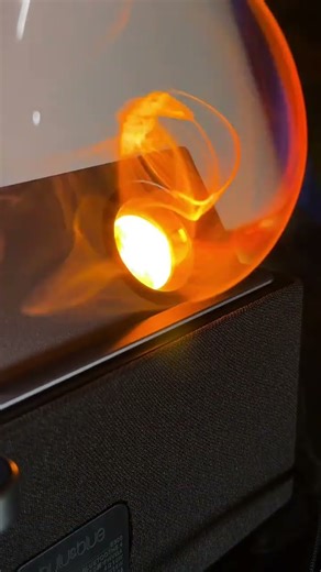 The high-end speaker displays lyrics and time, wireless charging, ambient lighting and white noi