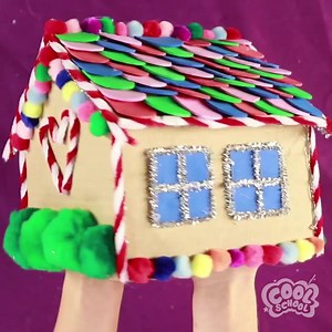 Happy #GingerbreadHouseDay! 🏠 DIY this easy cardboard gingerbread house just in time for the holidays! 🎄 Supplies: - Cardboard - Pipe cleaners - Paint markers - Glitter cardstock - Foam paper/craft foam - Hot glue gun - Pom poms Instructions: 1. Draw two lines that come to a point. This is the front of your house! 2. Cut it out! 3. Use the that piece to trace the same shape. This is the back of your house! 4. Cut it out! 5. Time to make the side of your house! Use one of the other pieces to me