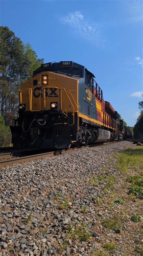 CSX local train L619 passes Cary NC at Fetner (Cedar St) NC&StLheritage unit 1851 leading 4/2/2026