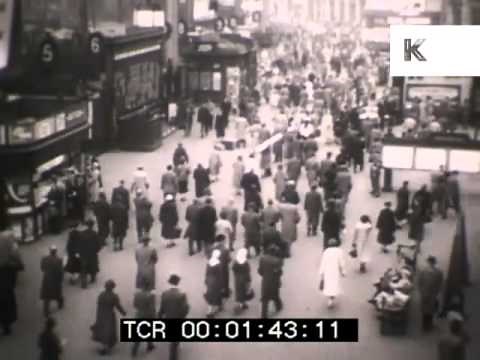 Commuters at Waterloo station, London, 1950s