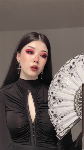 Rhythmic Hand Fan Movements Showcase