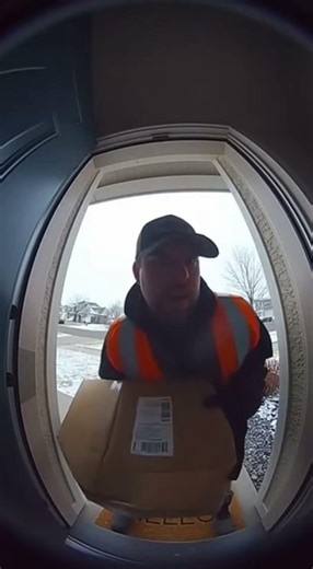 Angry delivery guy hits camera!