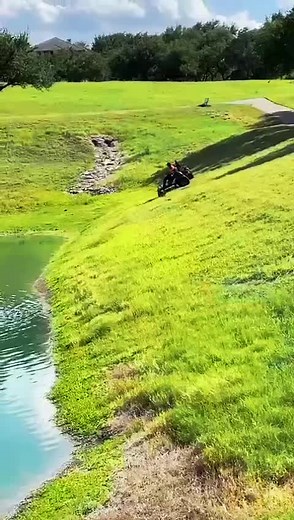 Riding a Lawn Mower in a Beautiful Park Setting