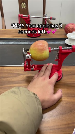Meet the apple-peeling machine that takes its job way too seriously. Just lock the apple, hit the crank, and watch it spiral into perfection. It slices. It peels.It cores. Basically everything except fixing your life -but it tries. Why it's oddly addictive:Perfect peel every. single. time. Mechanical ASMR energy Peel slice core in seconds The ultimate kitchen flex Would you actually use this... or just watch it spin all day? #KitchenGadget #SatisfyingVideo #FoodPrep Tool The Ultimate Apple-Peeli