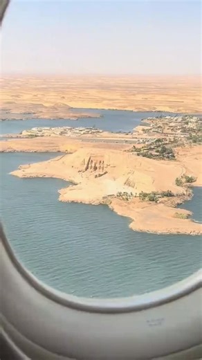 Flying Above Abu Simbel Temple ✈️🏛️ A rare view of one of Egypt’s greatest masterpieces — the majestic Abu Simbel Temple from above. Witness the colossal statues of Ramesses II carved into the mountain, glowing under the desert sun, just as they have for over 3,000 years. Follow us for more about Egypt 🇪🇬 🎥: @rafaelazzi #abusimbel #ramsesii #egypt #egypte #egipto #egito #ancientegypt #nubia #egypttravel #discoveregypt #templeofabusimbel | SkyScape Hot Air Balloon Luxor