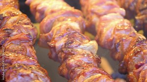 Cooking delicious skewers on barbecue grill in 4k slow motion 60fps