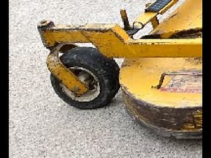 Walker MT Riding Mower - Replacing the tire tubes on the deck wheels.