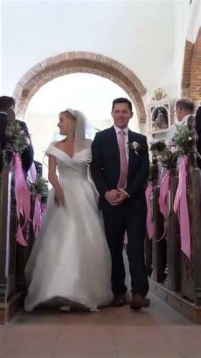 Bride and Groom Walk up the aisle
