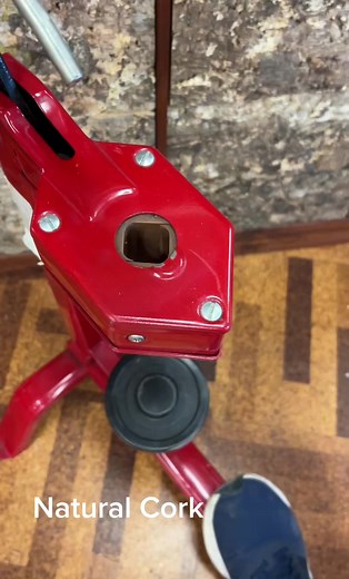 Natural, agglomerate and synthetic wine corks going in a bottle. #winecork #corking #bottling #cork #jelinekcork #stopper #wine