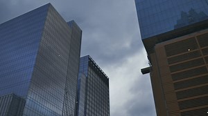 View to the tall buildings in the city from the ground - Free Stock Video