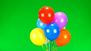 Flying balloons on green screen