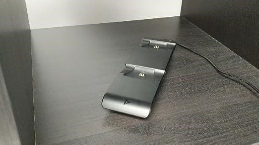 Micro-suction material on the bottom to keep charging base in place