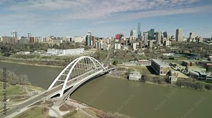 Cinematic, 4K aerial footage of downtown Edmonton and the river valley in the Spring