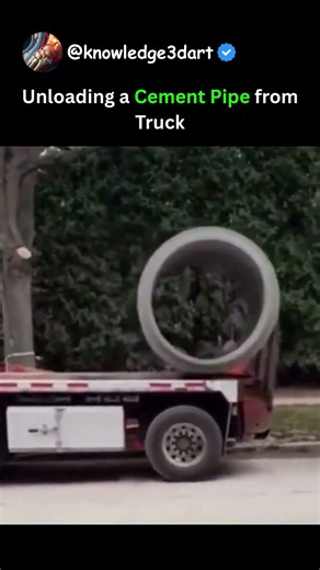 Unloading a Cement Pipe from Truck