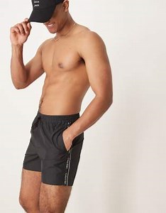Calvin Klein logo taping drawstring swim shorts in black | ASOS