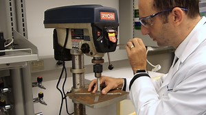 Multiplexing Focused Ultrasound Stimulation with Fluorescence Microscopy