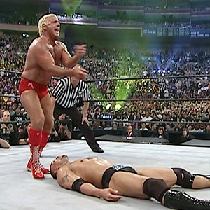 The Rock and Mick Foley reunited at #WrestleMania to take on Evolution's Batista, Randy Orton & Ric Flair! | WWE