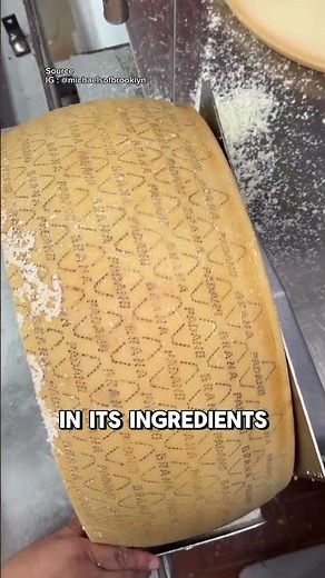 The process of cutting Italian Grana Padano cheese