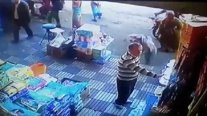 Woman floors man who tries to pinch her bum