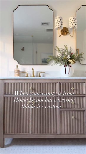 One of the best decisions we made when renovating our bathroom was buying this stunning vanity from @homedepot! We made it feel more custom by adding beautiful fixtures from @snowandjones. It’s a perfect mix of high and low and honestly people think it’s custom!!!! Comment shop and I’ll send you the link! It comes in various sizes and colors! | KBdesign02025