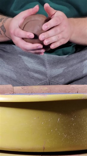 making a swirl utensil holder on the pottery wheel