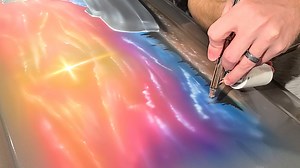 Last week I got a phone call from someone who wanted me to paint something I've never thought of painting. Airbrushing a casket sounded strange at first, but I quickly realized how special of a job it would be to help memorialize and honor the life of someone who had such a passion for what he did. I drove about 45 minutes to meet the kind woman and talk about the job. We decided this would be possible, but we would need to get started right away. The casket got home about 15 minutes after I did