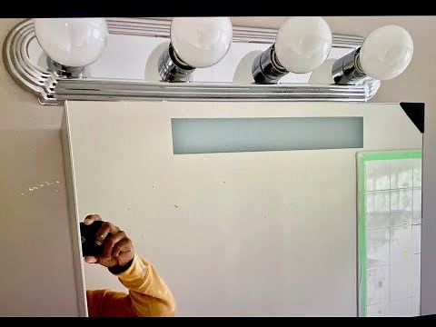 How to install a lighted medicine cabinet