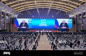 Kunming, China's Yunnan Province. 12th Oct, 2021. Russian President Vladimir Putin speaks via video at the leaders' summit of the 15th meeting of the Conference of the Parties to the Convention on Biological Diversity (COP15) in Kunming, southwest China's Yunnan Province, Oct. 12, 2021. Credit: Jiang Wenyao/Xinhua/Alamy Live News Stock Photo - Alamy