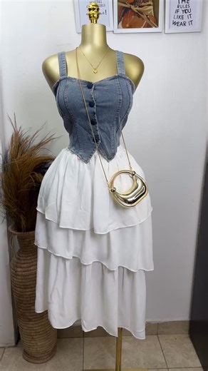 Komayewoman | Abuja Women’s Fashion on Instagram: "EXTREMELY GORGEOUS SKIRT COMBO. A MIDI LAYERED SKIRT AND A DENIM CORSET INSPIRED TOP SIZE: 8 PRICE: 19,000 Colour may vary due to lighting! Delivery is on WEDNESDAY Please place orders through the WhatsApp link in our bio. If you send a DM, please read the auto reply message and follow the instructions provided"