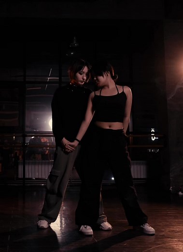 Dynamic Dance Routine in a Cityscape Studio