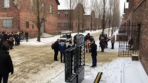 The Polish national anthem and placing wreaths at the Wall of Death at the yard of Block 11 at the former Auschwitz I camp began the 74th anniversary of the liberation of the German Nazi Auschwitz concentration and extermination camp. | Auschwitz Memorial / Muzeum Auschwitz