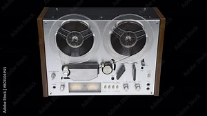 Old steel reel-to-reel tape recorder plays on a transparent background in 4K. With alpha channel