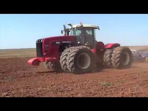 Versatile 575 Tractor pulling a 64 foot chisel plow - Munday Texas
