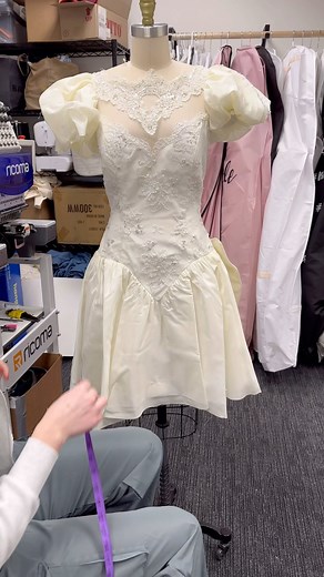 Rach on Instagram: "The first cut I did took off most of the length (it had a full skirt and massive train). I did that first cut laying the skirt side seam to side seam and using my rotary blade. Our bride decided to go a bit shorter (a little shorter than the length she initially requested) so we’re marking the skirt before adding the hem lace back on!"