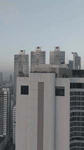 Vertical Drone Footage High-rise Buildings Against Stock Footage Video (100% Royalty-free) 3718625021 | Shutterstock