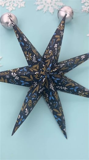 Judy on Instagram: "Use up any leftover wrapping paper or patterned paper and make paper stars to add to your decor! So super easy - you just need 5-9 squares of any size and with a few quick folds and some glue, you have a paper star! ✨ Follow for more Christmas ideas this season! #paperart #cricut #cricutmade #cricutcrafts #cricutchristmas #cricutproject #cricutcreations #teamcricut #makeitwithmichaels #makersgonnamake #handmadewithlove #handmadechristmas #christmasdecor #christmastree #christ