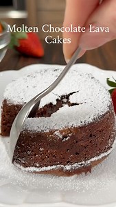 Molten Chocolate Lava Cake—Joe’s all-time favorite dessert! These rich and decadent cakes are pure chocolate heaven. Want the recipe? FOLLOW and reply with “lava cake,” and I’ll send it straight to your DMs! https://thesaltycooker.com/dairy-and-gluten-free-chocolate-molten-lava-cakes/ | The Salty Cooker