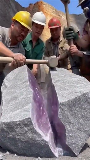 Miners Cracking Open a Massive Rock to Reveal Stunning Purple Amethyst Crystals