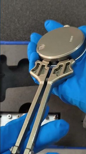 Inside caliper with interchangeable anvils used to measure dimension of internal holes and grooves