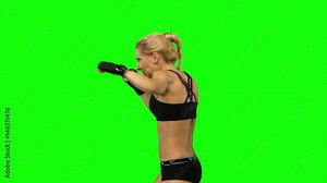 Boxer standing in the front and make swings and kicks. Green screen. Side view. Close up Stock Video