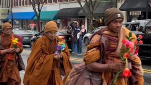 Buddhist monks make their way through Lexington, North Carolina
